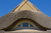 Thruscross thatch roofing